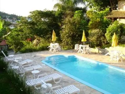 A piscina em ou perto de Pousada Guaruja