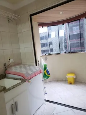 Uma cama ou camas num quarto em LINDO AP NA RUA 252, NO CORAÇÃO DE MEIA PRAIA