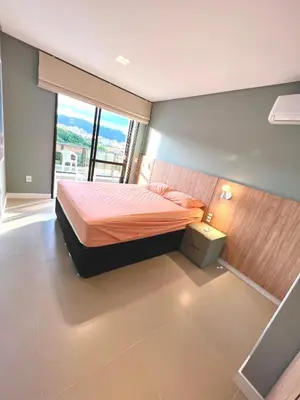 Uma cama ou camas num quarto em Cobertura Velejar em Condomínio Clube - com Área de Lazer