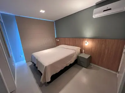 Uma cama ou camas num quarto em Cobertura Velejar em Condomínio Clube - com Área de Lazer