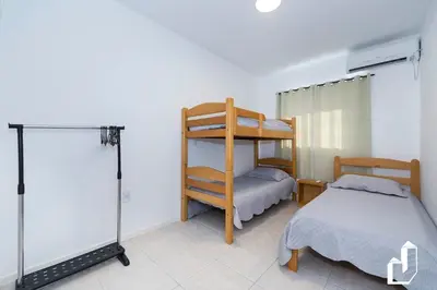 Uma cama ou camas num quarto em Apartamento duplex em 4 Ilhas