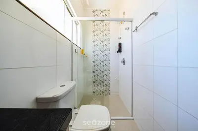 Uma casa de banho em Duplex pé na areia com vista deslumbrante RAT001