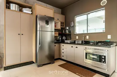 A cozinha ou kitchenette de Duplex pé na areia com vista deslumbrante RAT001