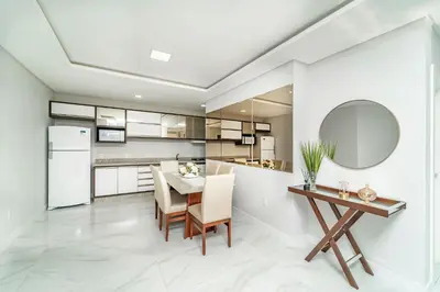 A cozinha ou kitchenette de Lindo Apartamento com 2 suítes e piscina em Bombas 705