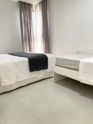 Uma cama ou camas num quarto em Conchas de Palmas