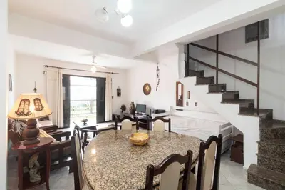 Uma área de estar em APARTAMENTO BEIRA MAR LATERAL NA PRAIA DE MARISCAL 2661