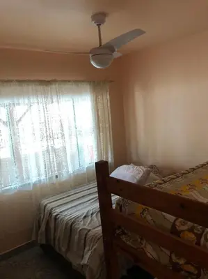 Uma cama ou camas num quarto em Residencial Marcelino