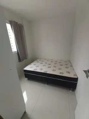Uma cama ou camas num quarto em Lindo Apartamento com 5 suítes perto do mar! No melhor lugar de Meia Praia