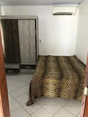 Uma cama ou camas num quarto em casa praia em bombinhas