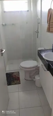 Uma casa de banho em Bombinhas Summer Beach - Apto 303