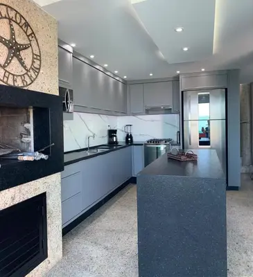 A cozinha ou kitchenette de Triplex pé na areia