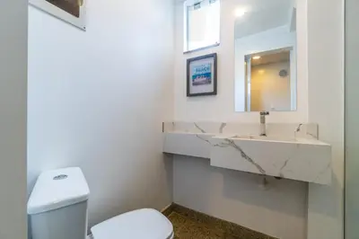Uma casa de banho em Triplex pé na areia