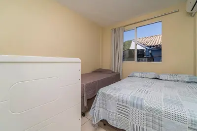 Uma cama ou camas num quarto em Residencial Eu Quero Sossego