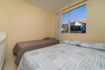 Uma cama ou camas num quarto em Residencial Eu Quero Sossego