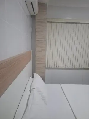 Uma cama ou camas num quarto em Casa 2 Encanto dos Mares