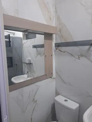 Uma casa de banho em Casa 2 Encanto dos Mares