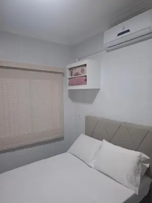 Uma cama ou camas num quarto em Casa 2 Encanto dos Mares