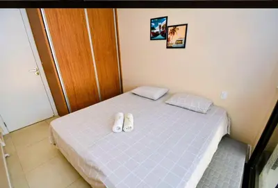 Uma cama ou camas num quarto em Spazio di Patricia - piscina aquecida