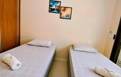 Uma cama ou camas num quarto em Spazio di Patricia - piscina aquecida
