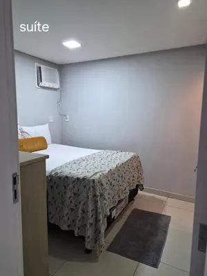 Uma cama ou camas num quarto em Casa com piscina em Balneário Camboriú