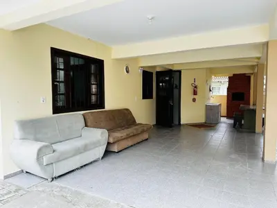 Uma área de estar em Residencial 305 - Localização privilegiada à 5min da praia