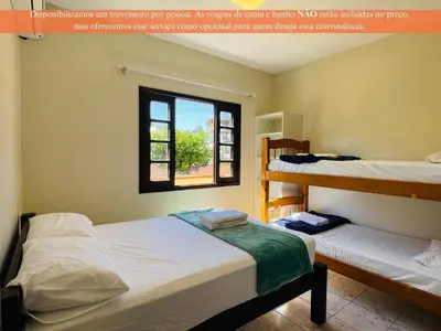 Uma cama ou camas num quarto em Residencial 305 - Localização privilegiada à 5min da praia