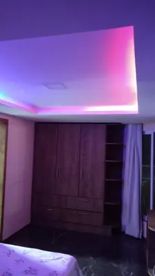 Uma cama ou camas num quarto em Apartamento de Cobertura frente para o mar Itapema