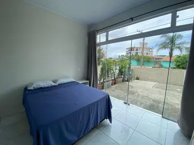 Uma cama ou camas num quarto em Casa entre dois mares - Casa Bege