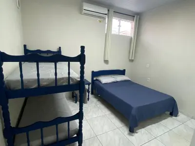 Uma cama ou camas num quarto em Casa entre dois mares - Casa Bege