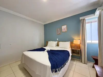 Uma cama ou camas num quarto em Hospedaria Sol da Manhã