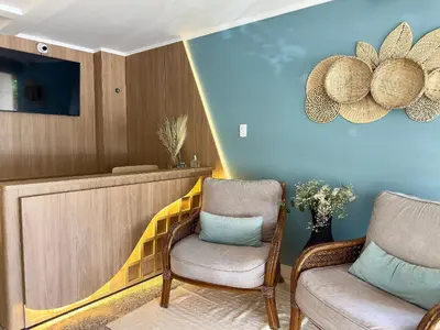 Uma área de estar em Hospedaria Sol da Manhã