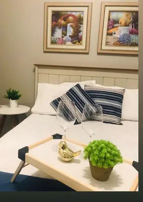 Uma cama ou camas num quarto em Mix aparts Tijucas -kit 10