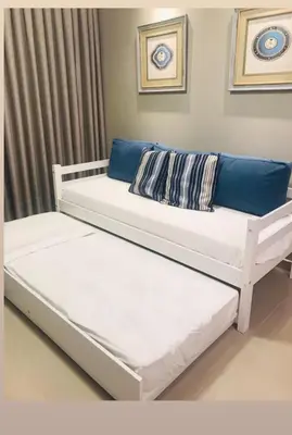 Uma cama ou camas num quarto em Mix aparts Tijucas -kit 10