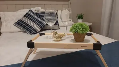 Uma cama ou camas num quarto em Mix aparts Tijucas -kit 10