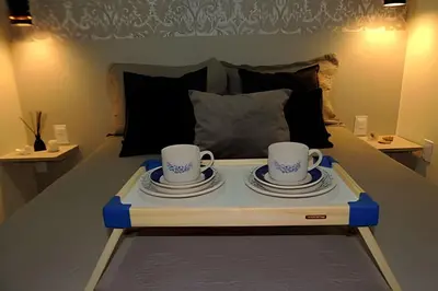 Comodidades para chá e café em Apto Climatizado com varanda próximo a praia