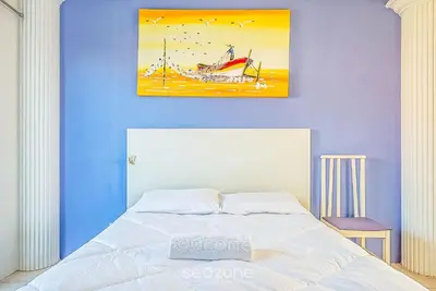 Uma cama ou camas num quarto em CCM - Condomínio a 150m da Praia do Mariscal