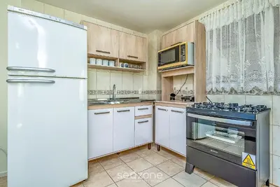 A cozinha ou kitchenette de CCM - Condomínio a 150m da Praia do Mariscal