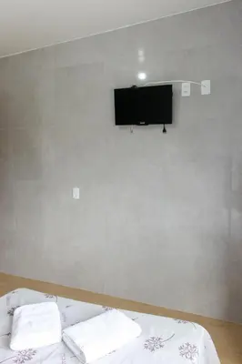 Uma cama ou camas num quarto em CASA OLINDA - XXEstudio e SuitesXX wifi Ar split e Piscina YY
