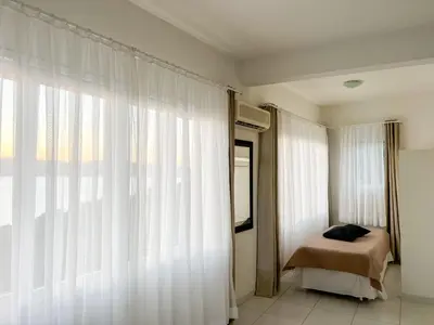 Uma cama ou camas num quarto em Guesthousebr