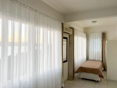 Uma cama ou camas num quarto em Guesthousebr