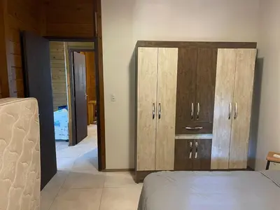 Uma cama ou camas num quarto em casa praia miseria