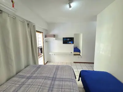 Uma cama ou camas num quarto em Cobertura aconchegante 3 quartos excelente vista mar! 80 metros do mar em Meia Praia - Itapema