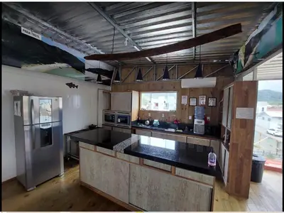 A cozinha ou kitchenette de Trip Adventure Hostel