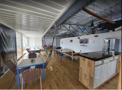 A cozinha ou kitchenette de Trip Adventure Hostel