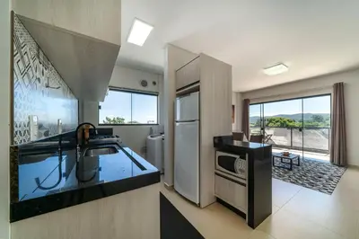 A cozinha ou kitchenette de Coberturas e apto para locação em Bombinhas, Mariscal