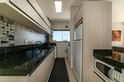A cozinha ou kitchenette de Coberturas e apto para locação em Bombinhas, Mariscal