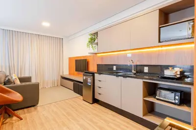 A cozinha ou kitchenette de Confortável Loft com Vista para o Mar, Condomínio com Piscina