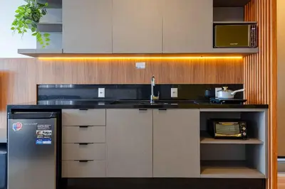 A cozinha ou kitchenette de Confortável Loft com Vista para o Mar, Condomínio com Piscina