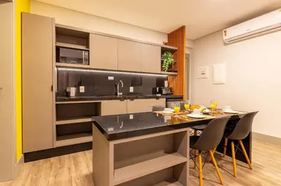 A cozinha ou kitchenette de Confortável Loft em Condomínio com Piscina