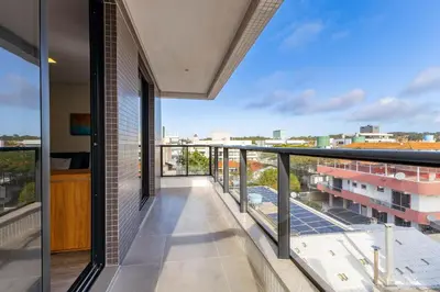 Uma varanda ou terraço em Confortável Loft em Condomínio com Piscina